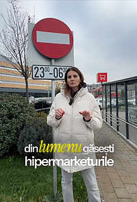 Captură de ecran din video-ul publicat de Anca Alexandrescu pe Facebook, pe 5 decembrie 2025. În spatele ei se vede un magazin mare, de tip hipermarket, pe care îl recunoaștem ca fiind magazinul Kaufland de pe bulevardul Barbu Văcărescu nr. 120, București.